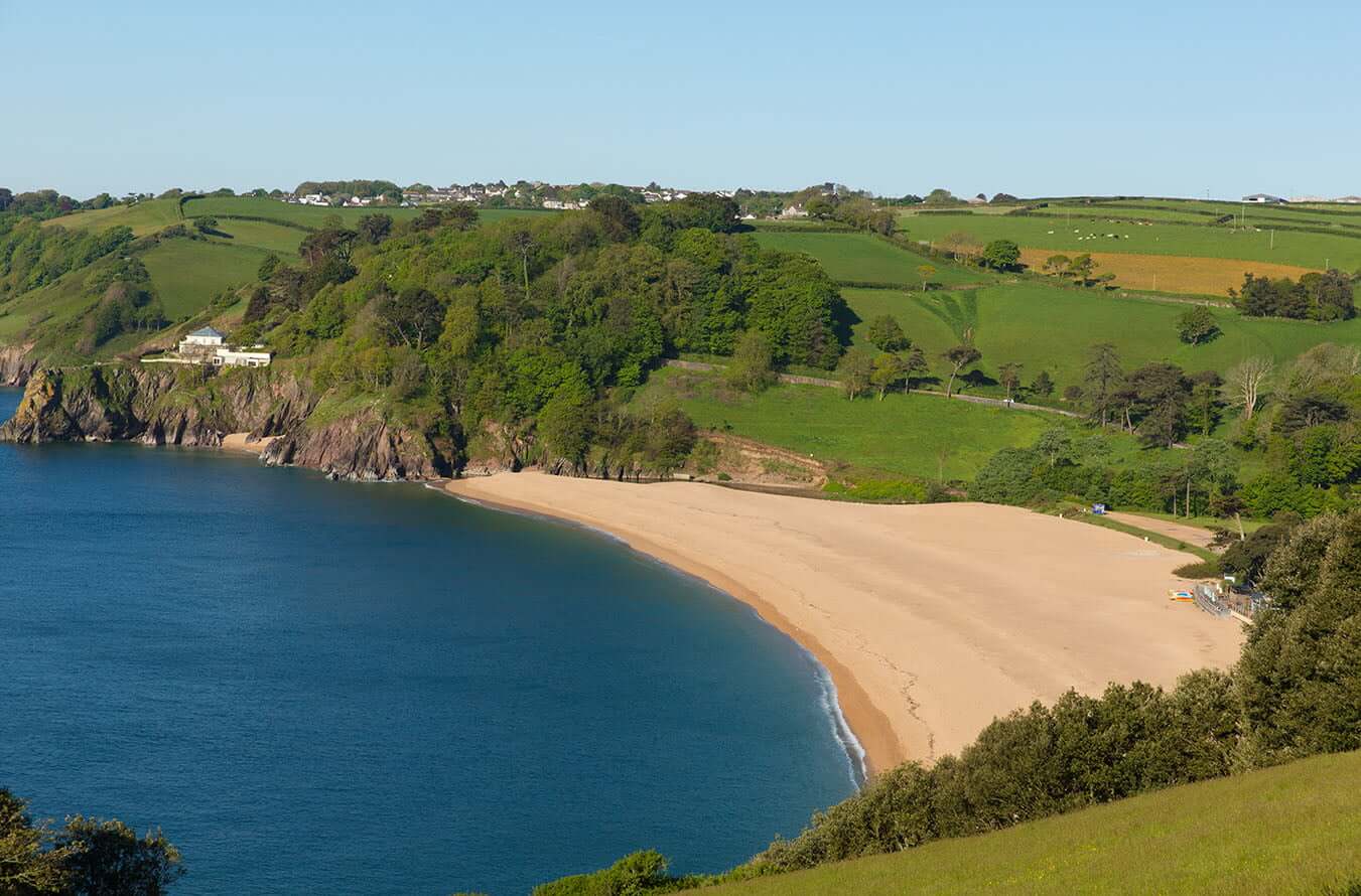 Lady in the dunes on a North Devon beach