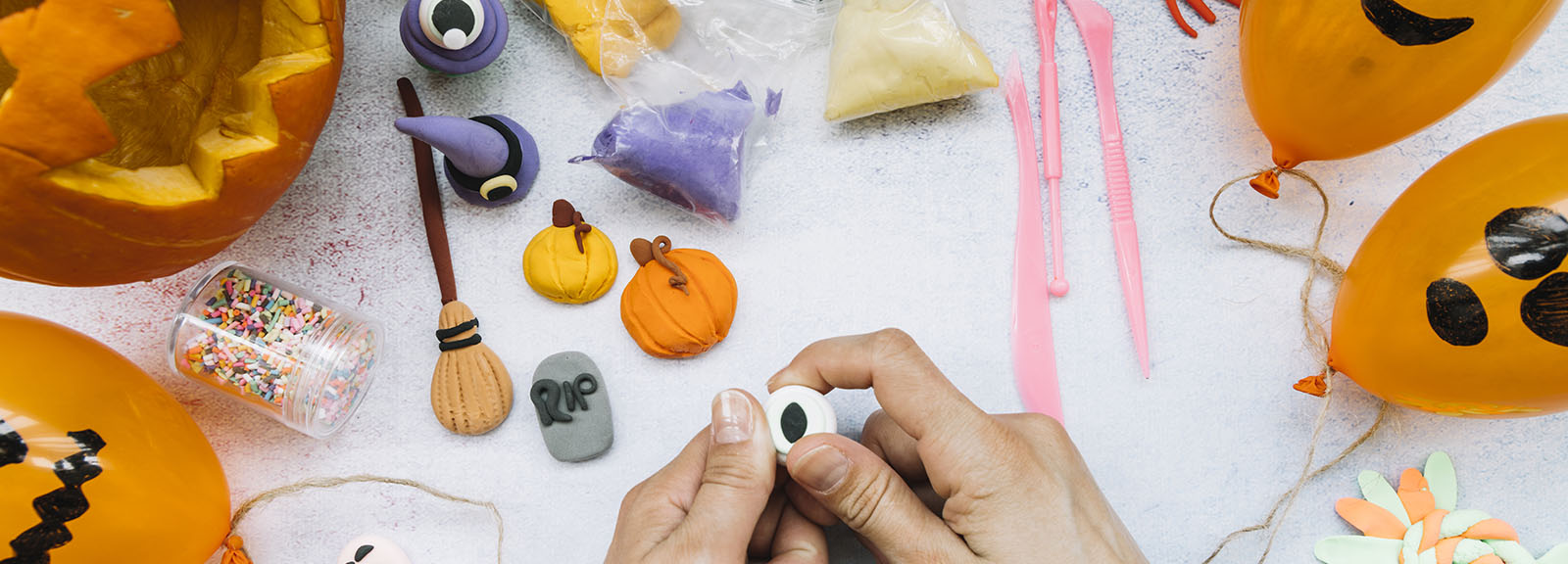 creative-workplace-with-plasticine-halloween-figures