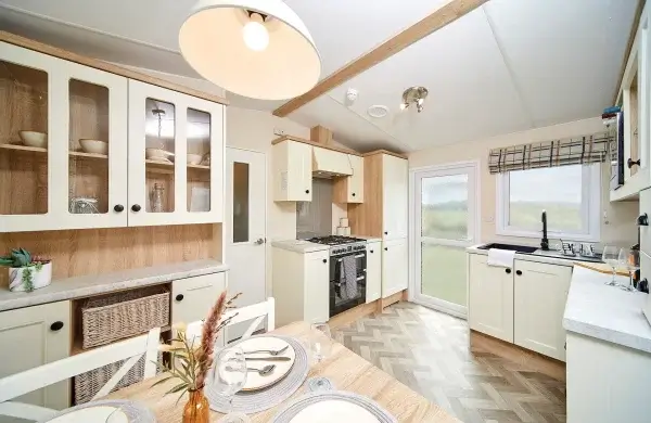 An attractive country-style caravan kitchen diner