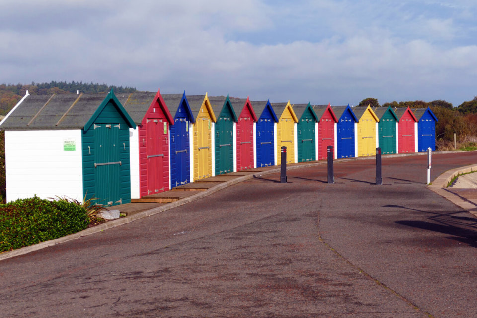 Colourful beach huts at Dawlish Warren