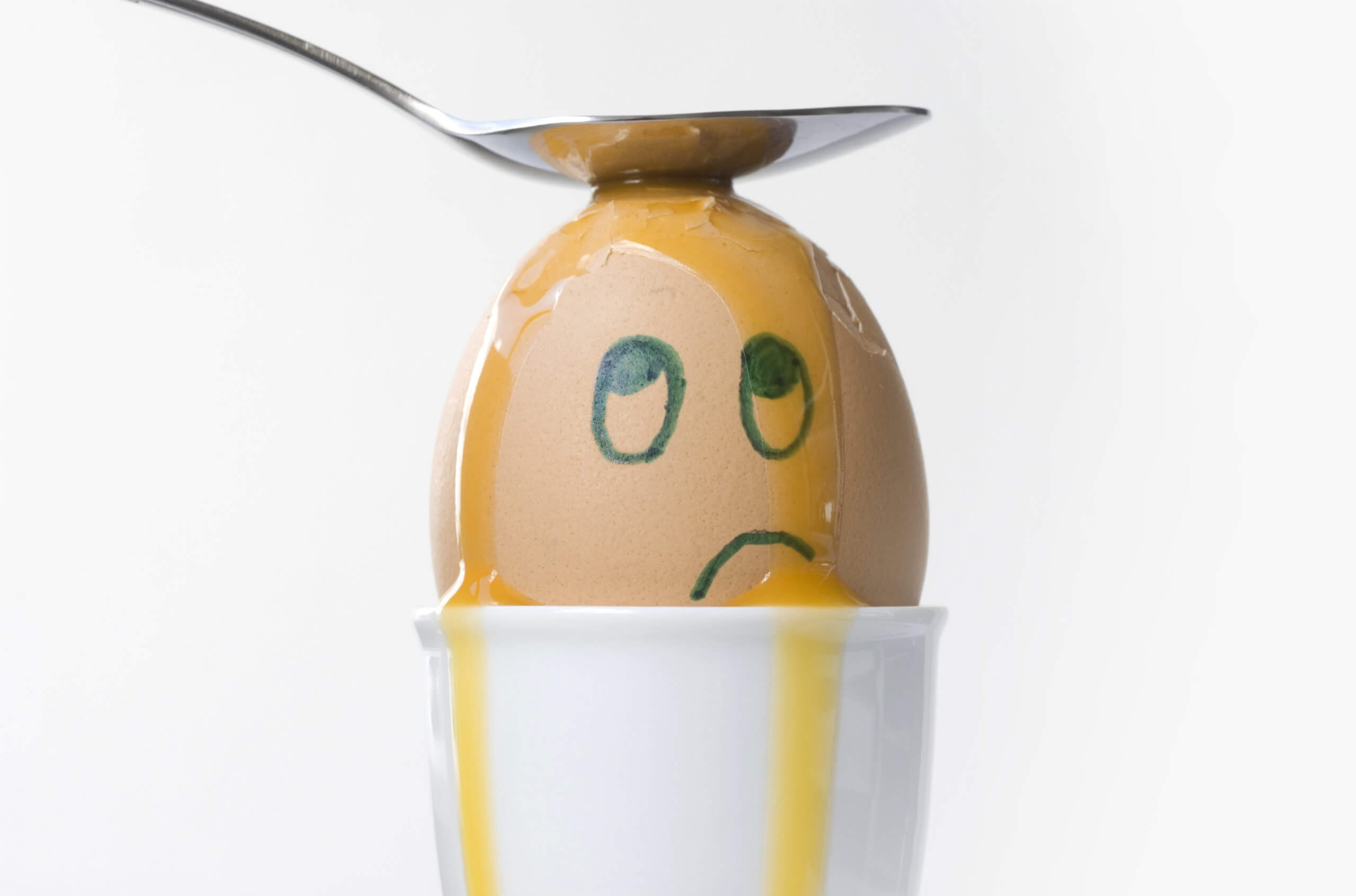 An unhappy, confused and dazed boiled egg.