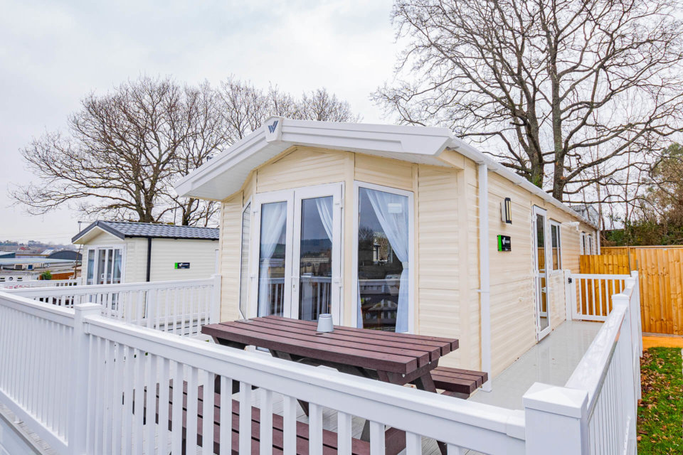 Firs Premier Mini Lodge exterior and private decking